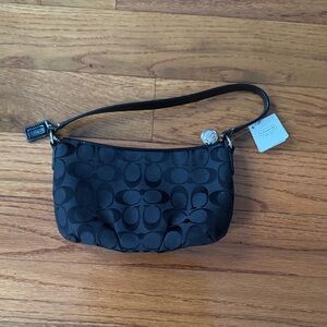 Coach black purse - never used